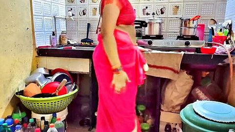 Sexy Indian MILF in tight red saree teasing big ass in kitchen