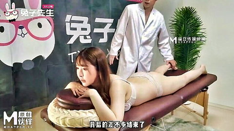 Asian beauty in white lingerie gets booty massage from masseur
