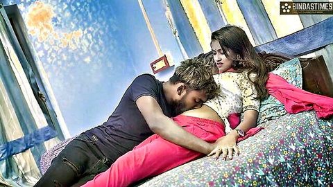 Indian boyfriend spooning girlfriend from behind groping her tits passionately on bed