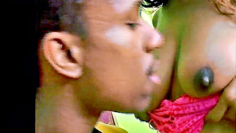 Ebony couple intimate breast kiss, big tits exposed in pink lace