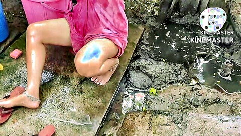 Indian housewife squats legs spread in wet pink robe outdoors teasing thighs