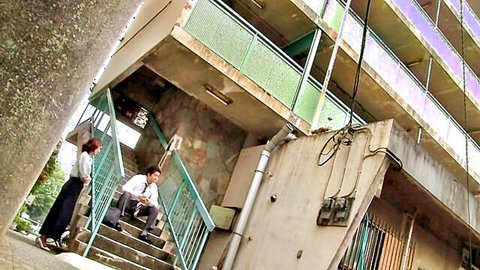 Asuka Ishihara in Japanese JAV thumbnail: married woman chats with man in suit on stairs