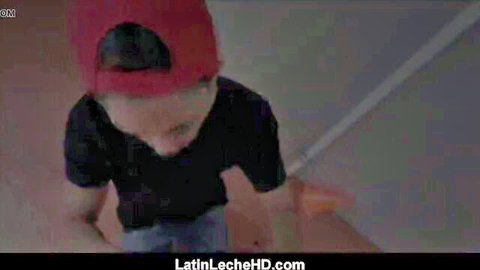 Skinny young Asian twink in red cap bends over smiling playfully teasing his ass