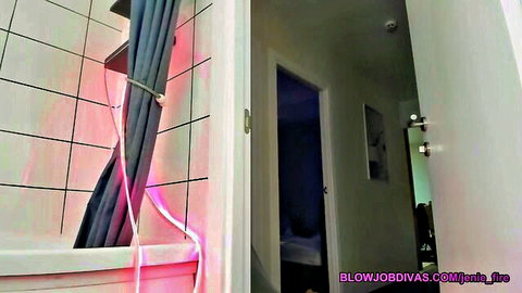 Neon-lit shower curtain in empty bathroom for webcam blowjob divas setup