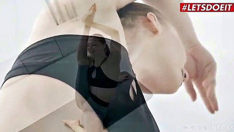 Mia Split flexible yoga stretches in tight black sports bra