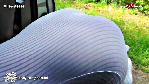 Skinny German MILF in tight pants bent over car for public outdoor sex