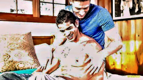 Dalton Riley and Jason Richard in intimate gay embrace, muscular bodies shirtless