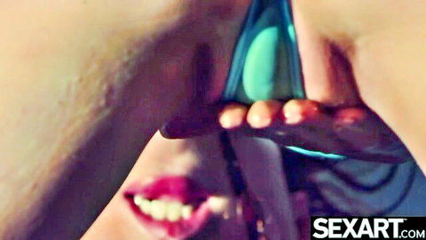 Ariel Rebel performs cunnilingus on redhead, using toy for intense orgasm