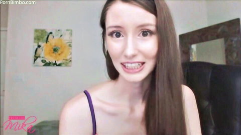 Princess Mika smiling in purple lingerie for humiliating tasks video