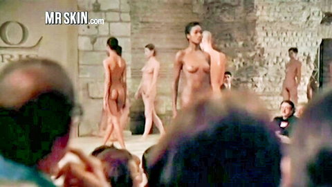 Nude supermodels strutting topless on stage in feature film scene