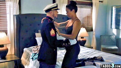 Dana Vespoli as widowed Asian stepmom embraced by stepson in uniform