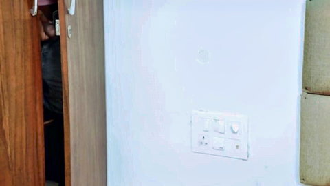 Desi porn star Pratibha peeking from door in sexy Indian XXX video