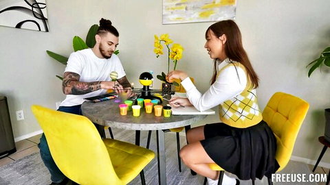 Violet Moore in yellow argyle sweater and skirt playing game with tattooed guy in FreeUse Fantasy