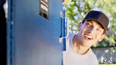 Theo Brady peeking smiling from blue door in gay farm scene, Men studio