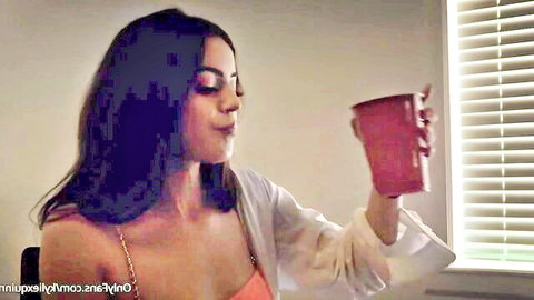Kylie Quinn perky tits brunette in open robe teasing with red cup