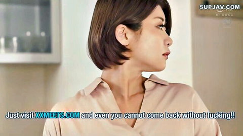 Seductive Asian brunette MILF housewife in tight blouse teasing with cleavage in kitchen