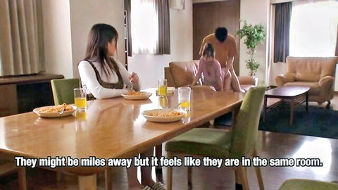 Clothed Japanese housewife dines while nude big ass babe rides cock on couch