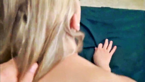 Blonde woman in doggy style with hand gripping her back during taboo cousin fuck