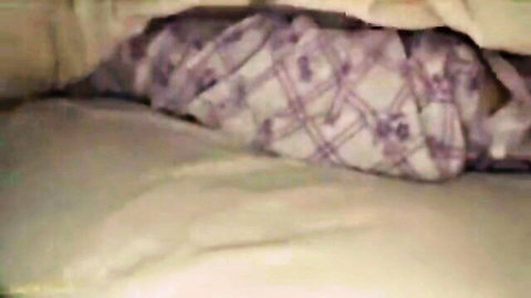 East Asian babe's smooth thighs and ass teasing under purple floral sheets