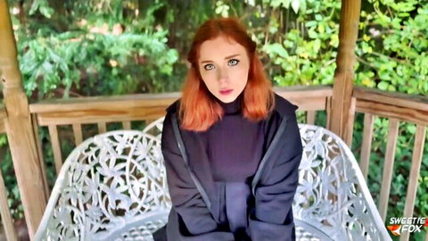 Sweetie Fox beautiful redhead fairy in black turtleneck, teasing pose