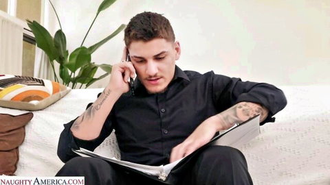Tattooed man in black shirt talking on phone - Payton Preslee scene