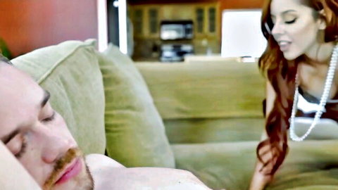 Slim redhead in lingerie teases sleeping naked stepbrother with BJ on couch