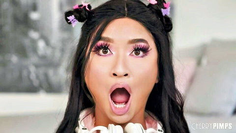 Petite Asian Avery Ebony with open mouth in pink lingerie