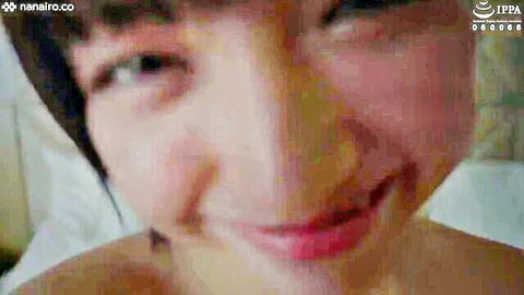 Smiling Japanese beauty with short hair in close-up, from hairy G-cup JAV