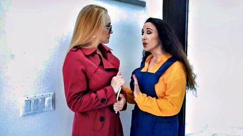 Wendy Raine in red trench coat confronts surprised brunette in sexy dress