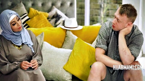 Hijab MILF tempts vacation partner in intimate couch chat
