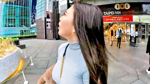 Curvy Taiwanese babe with huge natural tits in tight blue top posing seductively at Taipei 101 POV