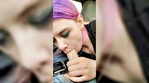 POV closeup of purple-haired woman giving blowjob in car