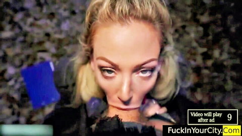 Busty blonde stepmom close-up gaze in adult scene