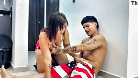Latina stepmom in red bikini teases tattooed guy's crotch with American flag wrap