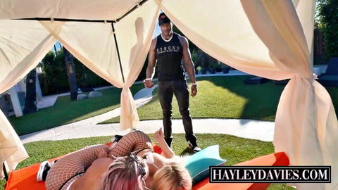 Blonde Hayley Davies in red lingerie teases Jason Luv outdoors