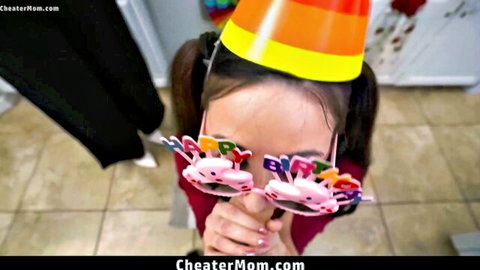 Asian stepmom in party hat and glasses teases POV view for birthday cheer-up