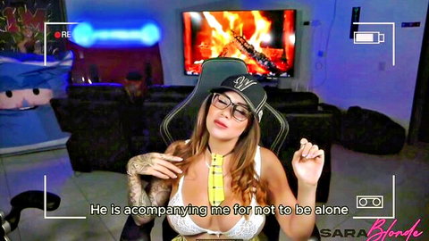 Sara Blonde teasing in white bra and cap during live stream