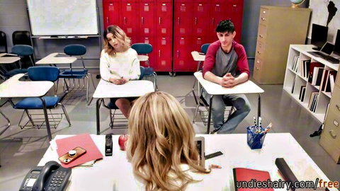 Busty blonde teacher and brunette student tease young guy in class