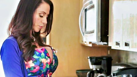Ariella Ferrera in floral dress teasing cleavage