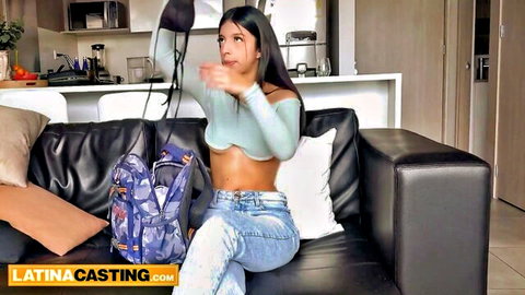 Tiny Latina brunette with big booty in sexy off-shoulder top and jeans for casting