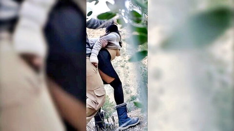 Submissive woman bent over outdoors, pants down for creampie and spanking