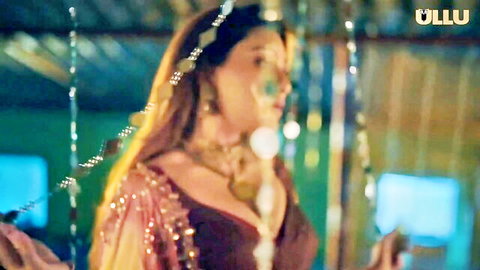 Seductive Indian woman in ornate saree and jewelry, Ullu hot scene
