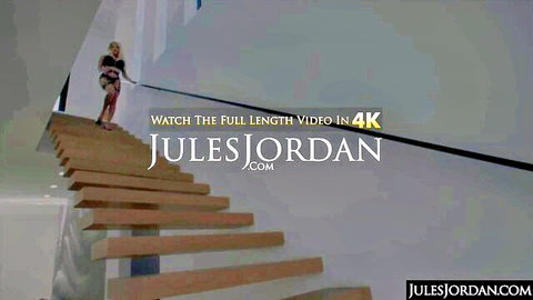 Blonde beauty in tight black outfit ascending stairs, Jules Jordan tease