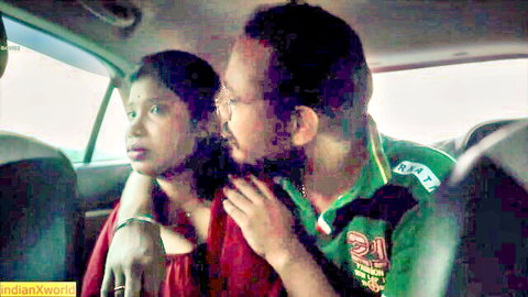 Intimate Indian couple in car, desi girlfriend close embrace