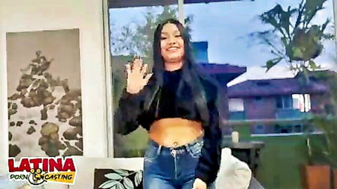 Sexy smiling Latina teen in amateur casting waves hello in black crop top and tight jeans perfect ass