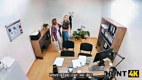 Blonde in plaid shirt chats in office interview with friend, Stanley Johnson sex scene