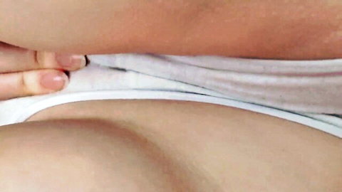 Amateur teen pulls white panties aside exposing shaved wet pink puffy pussy closeup