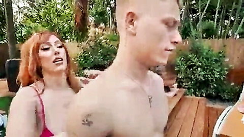 Redhead stepmom teases shirtless stud in sunny outdoor poolside fun