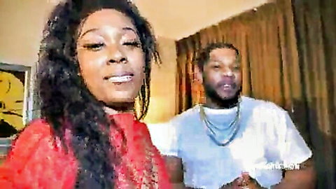Ltee The Motivator in red dress with partner, smiling promo thumbnail