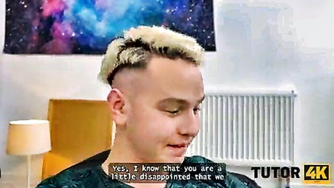 Young Russian tutor with blonde undercut looks disappointed in lesson